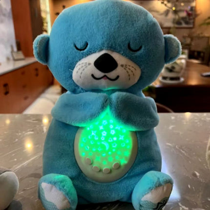 Sovende oter kosedyr med nattlys