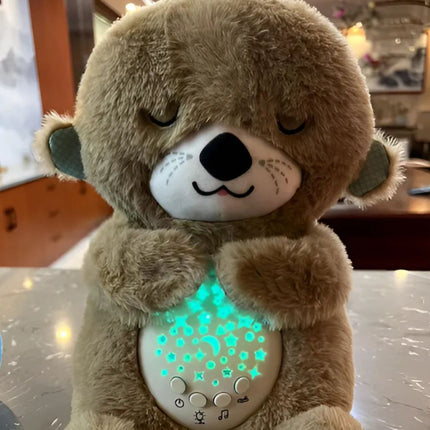 Sovende oter kosedyr med nattlys