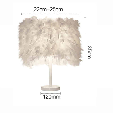 Elegant nattbordslampe med fjærdekorasjon
