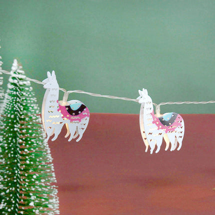 Dekorativ lyslenke med lama figurer