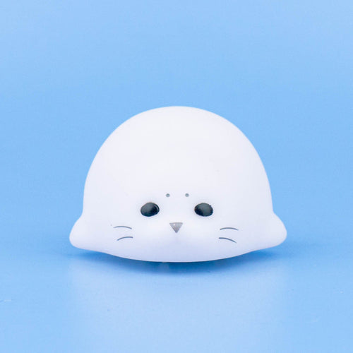 Lite nattlys formet som en sel