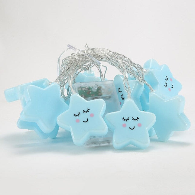 Blå stjernelyslenke for en koselig atmosfære