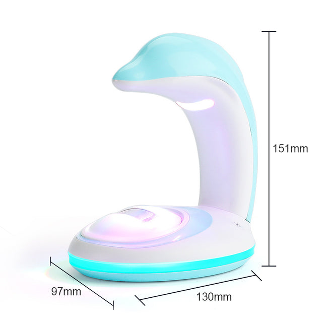 Fargerik hval nattlys med regnbueprojektor