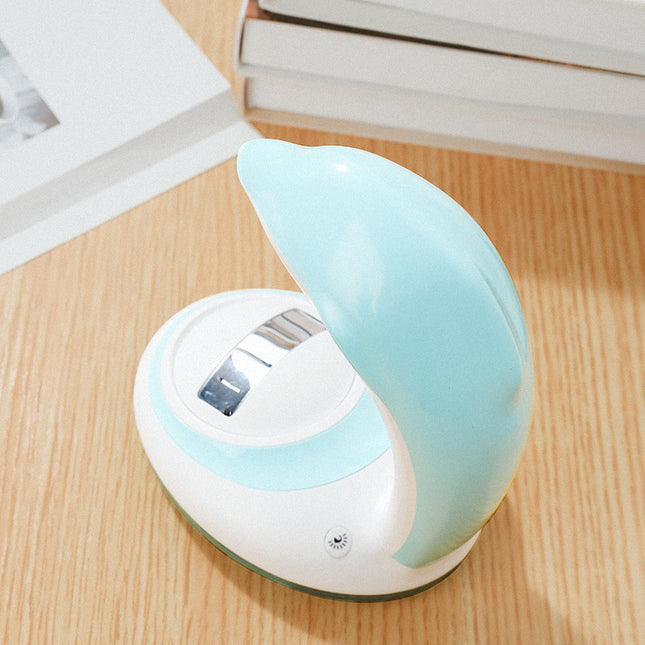 Fargerik hval nattlys med regnbueprojektor