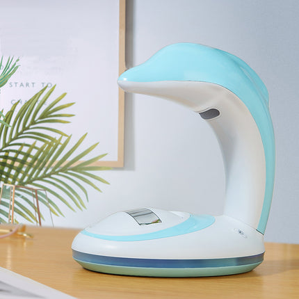 Fargerik hval nattlys med regnbueprojektor