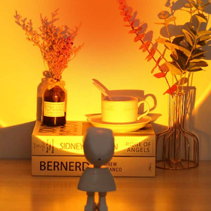 Astronaut nattlys med solnedgang projeksjon